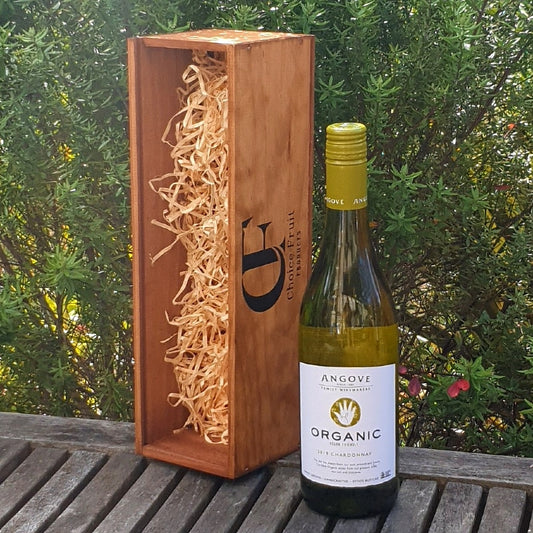 Angove Organic wine bottle with wooden gift box on a table outdoors