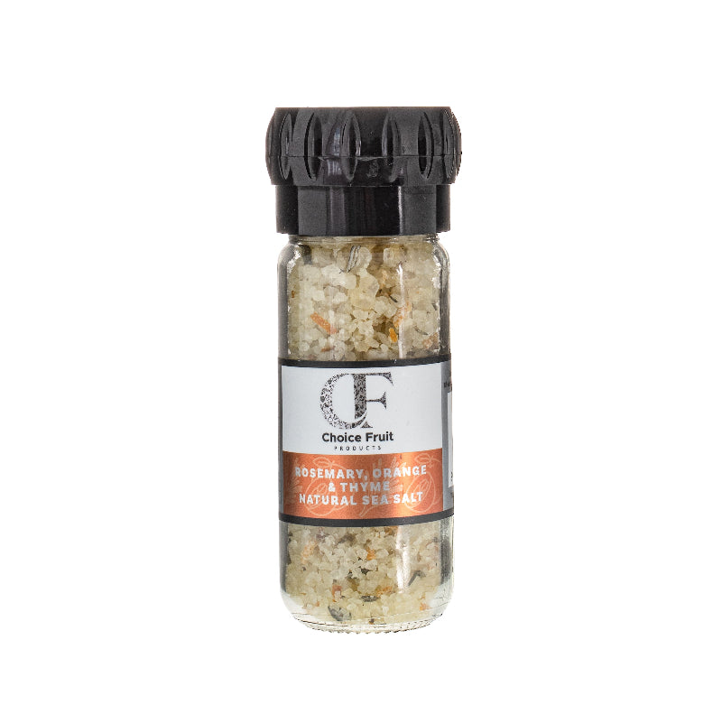 Shaker of rosemary, orange, and thyme salt with a black lid on a white background