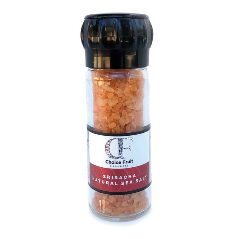 A clear glass grinder bottle filled with natural sea salt, labelled 'Sriracha Natural Sea Salt' from Choice Fruit.